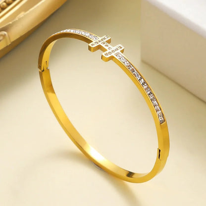 High-polish bangle bracelet with H initial centerpiece and sparkling zirconia row – luxury fashion jewelry
