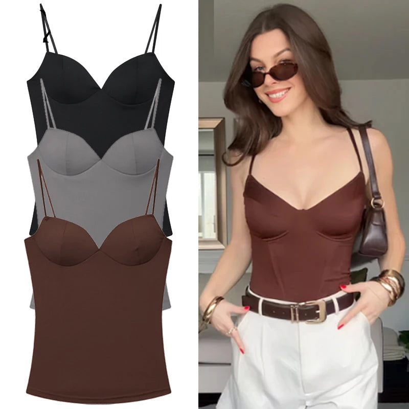 Three spandex tank tops in black, gray, and brown with a model wearing a brown tank top.