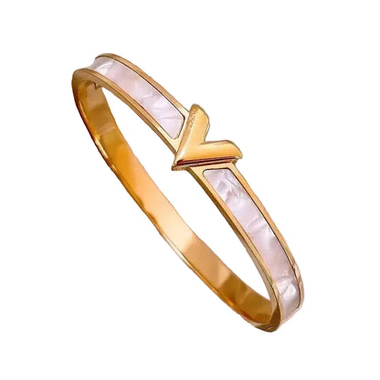 Gold V-shape bangle bracelet with white shell inlay – women's minimalist stainless steel jewelry
