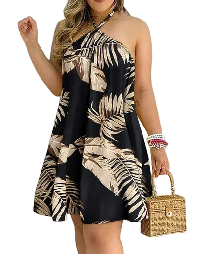 Woman wearing a black and beige leaf-patterned dress 