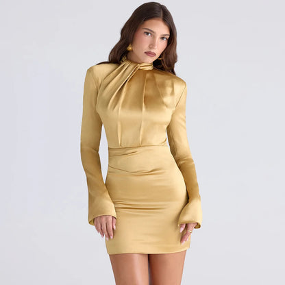 Close-up of luxurious satin fabric with textured ruching on turtleneck dress