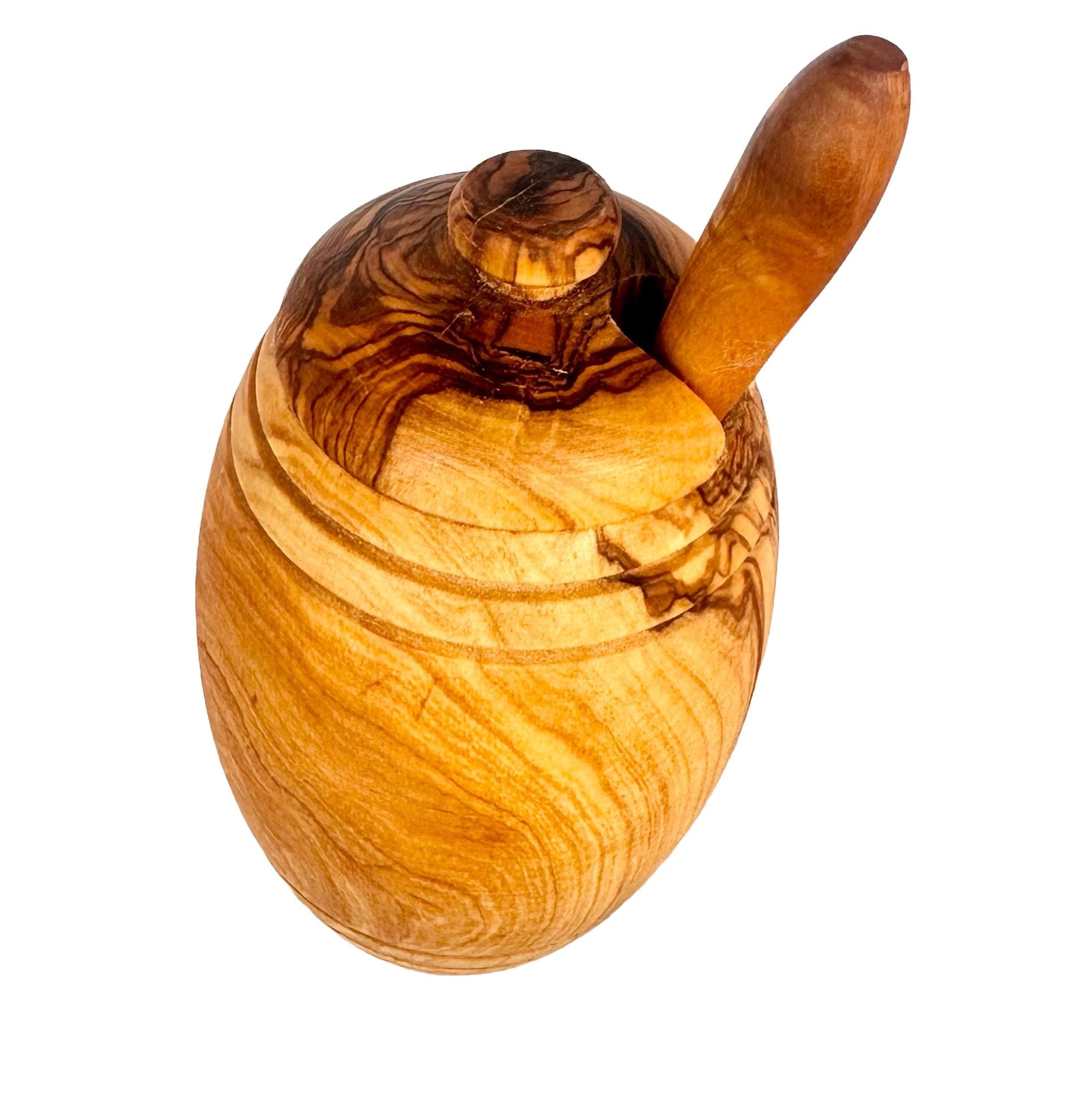 Wooden honey dipper with a textured surface 