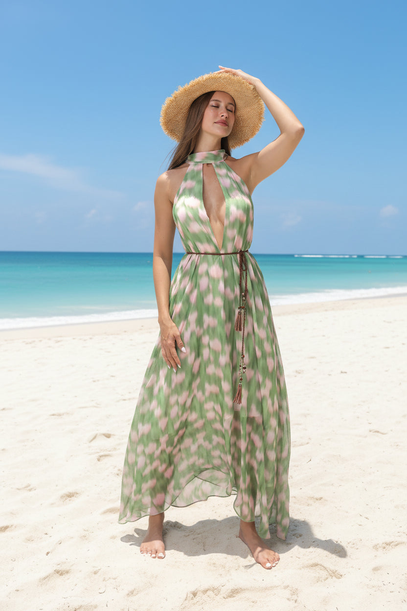 Women's green printed sleeveless midi dress with relaxed silhouette — full length view
