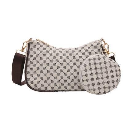 
White colored crossbody messenger bag with secure pocket storage
