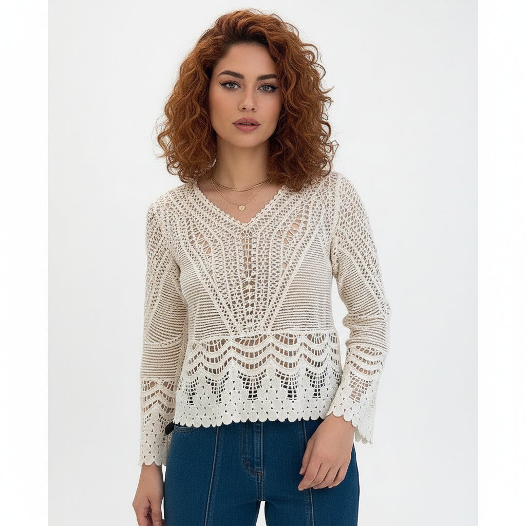  white lace top and blue jeans on a woman with curly hair 