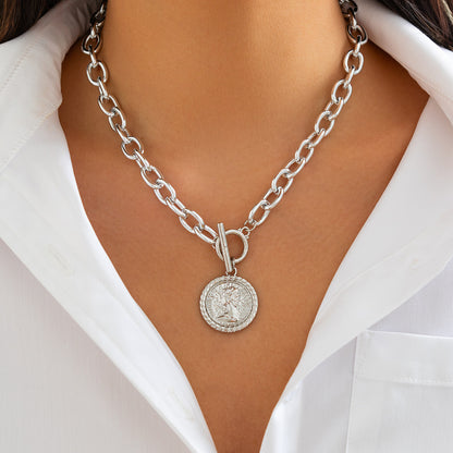 Silver chain necklace with a medallion 