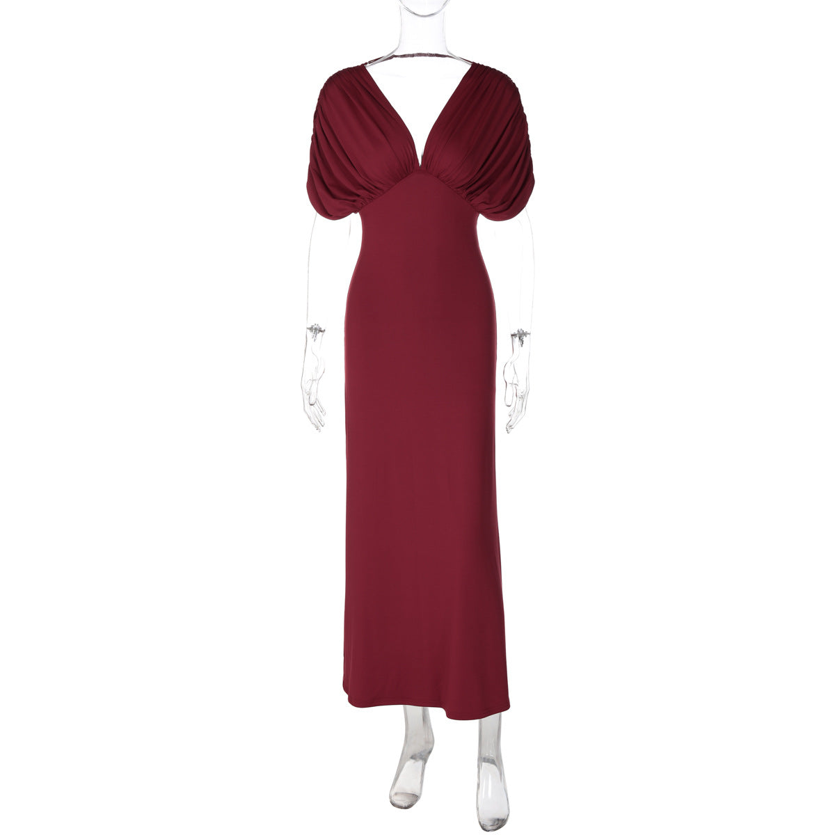 A floor-length burgundy dress displayed on a clear mannequin against a plain white background. The dress features a draped, gathered neckline with short puff sleeves and a fitted silhouette.