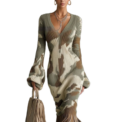 Long sleeve knit dress featuring textured ribbing and artistic pattern

