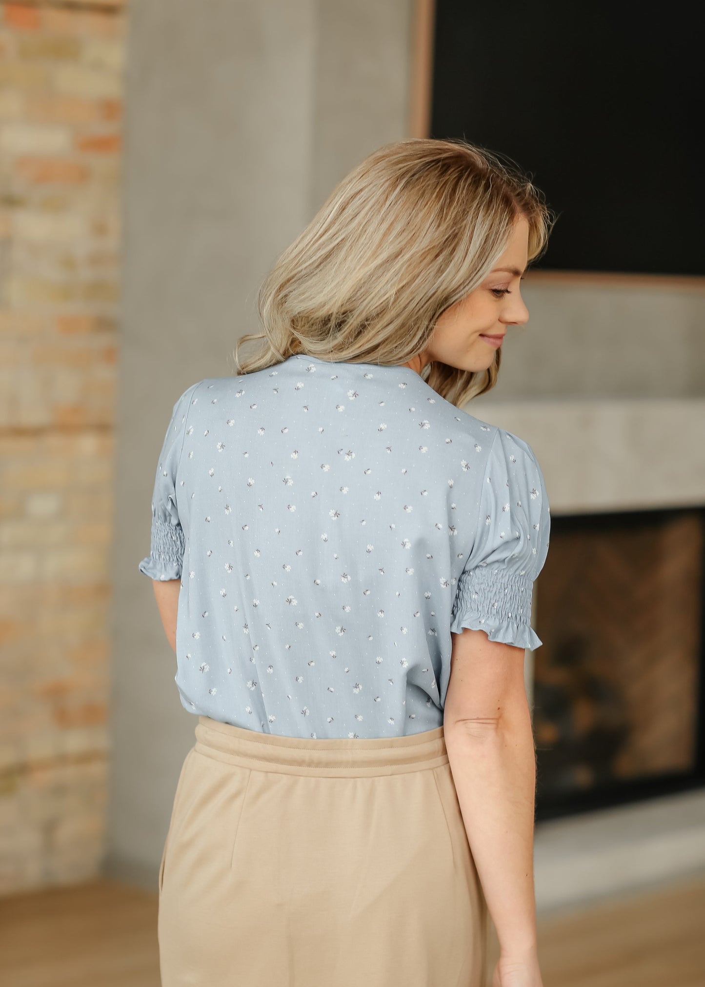 Alisa Ruffle Sleeve Top paired with knit skirt for a chic modest look