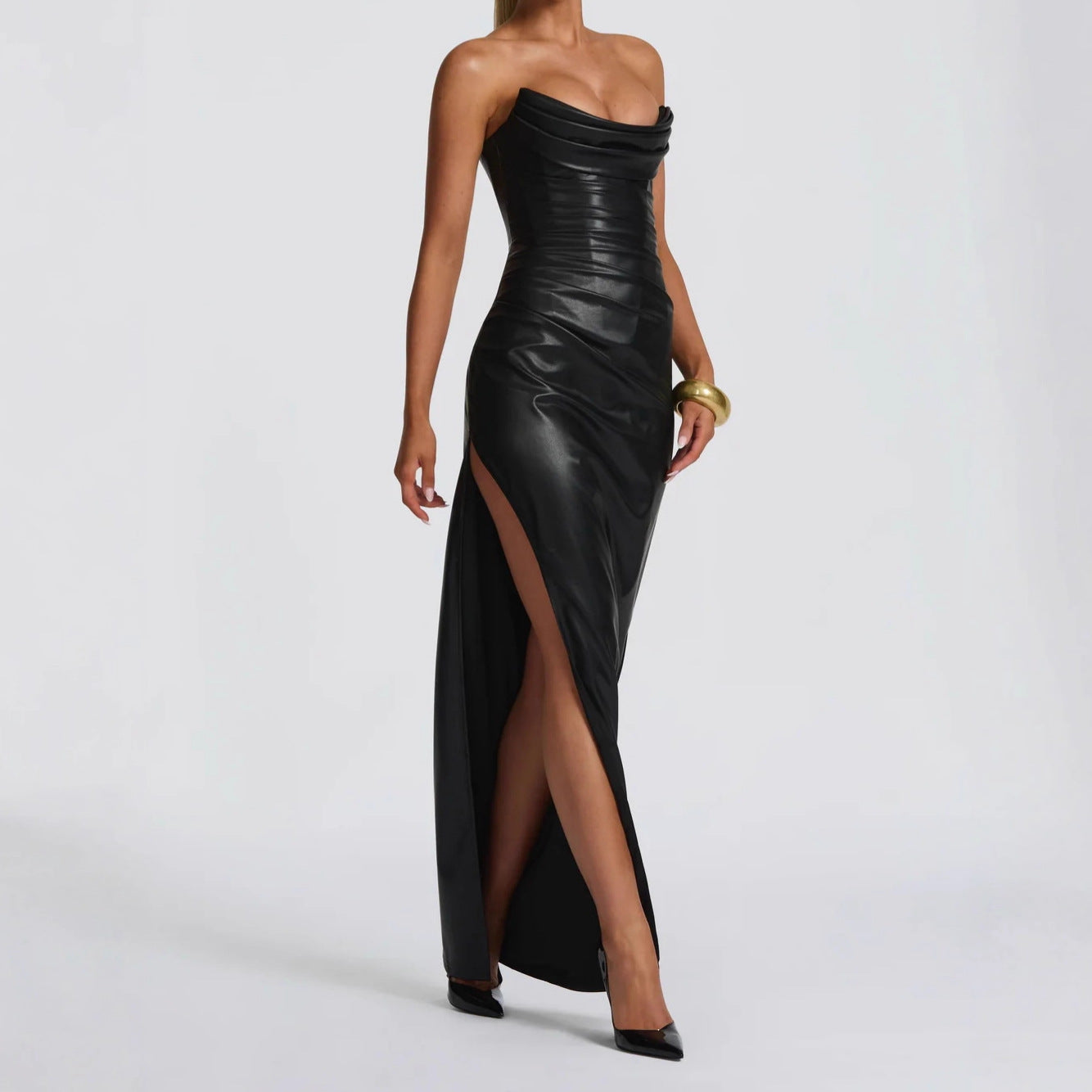 Black strapless gown with a high slit