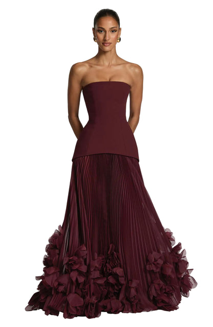Strapless Formal Gown with Cinched Waist, Accordion Pleats, and Couture Petal Hem Detail