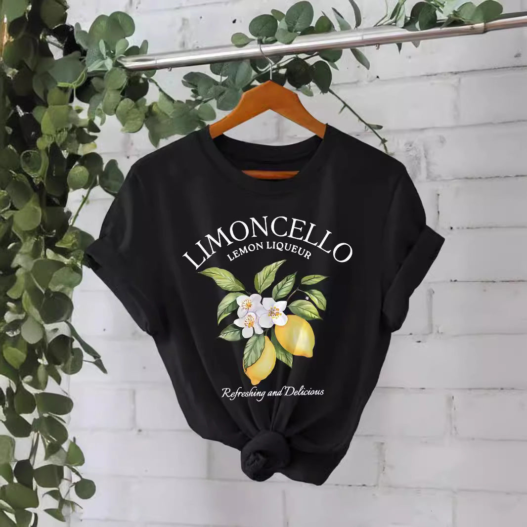 Black Limoncello lemon print graphic t-shirt on hanger — "Refreshing and Delicious" botanical lemon design
