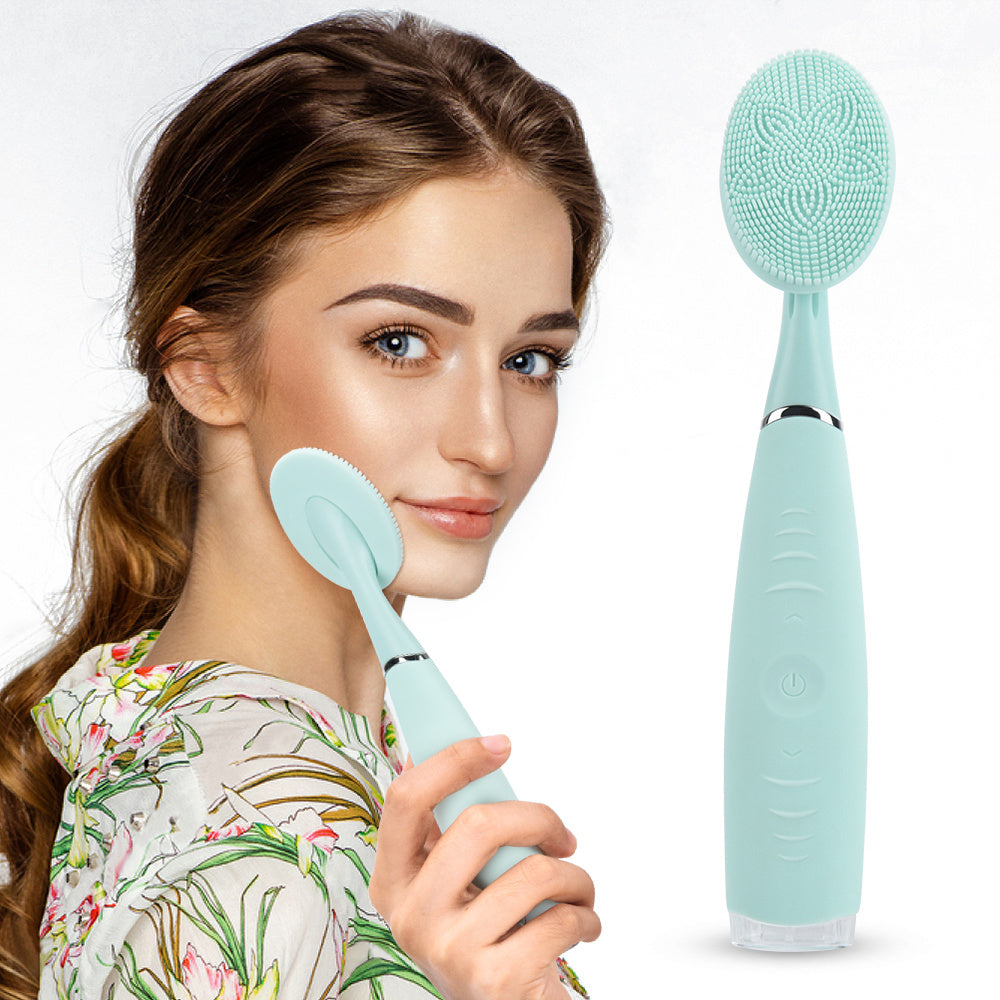 Portable electric facial cleansing brush with silicone bristles