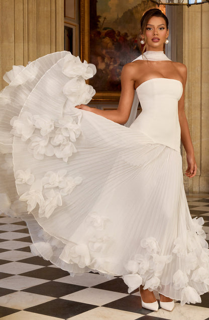 Floor-Length Strapless Elegant Dress with Sculptural Petal Border and Full Pleated Skirt
