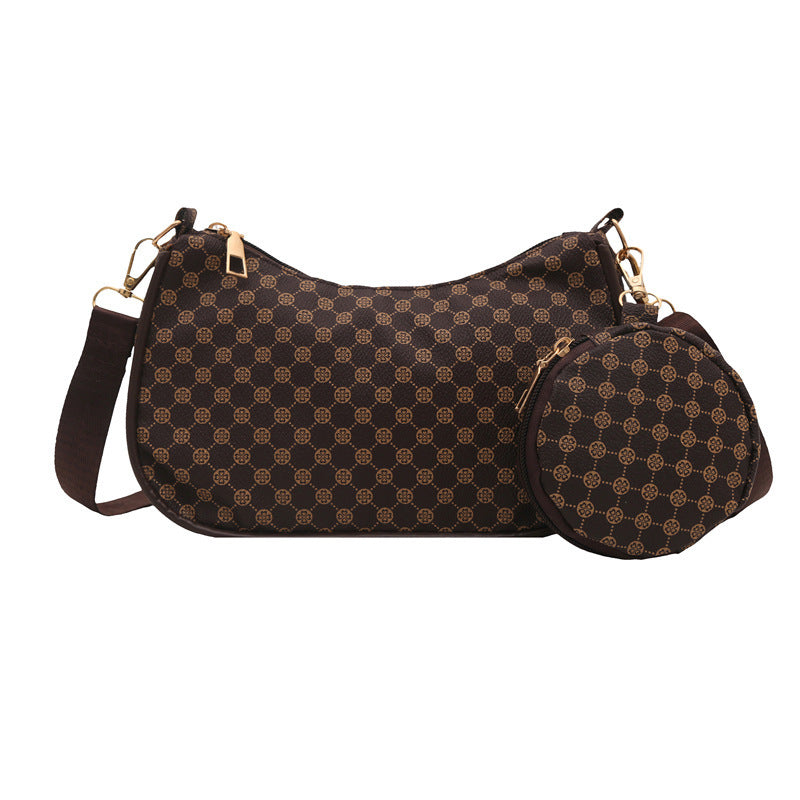 Brown patterned handbag with matching pouch 