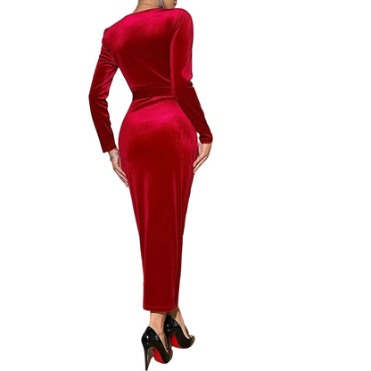 Person wearing a red velvet dress in an elegant room 