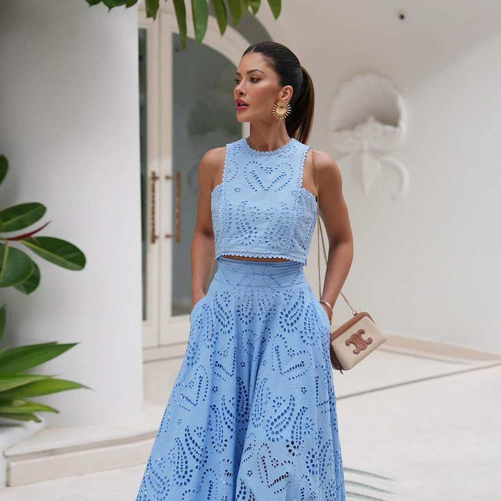 Woman wearing a light blue lace skirt set 