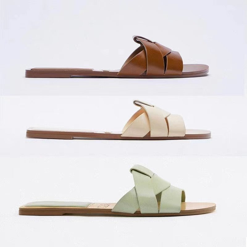 Three pairs of sandals in brown, beige, and green 