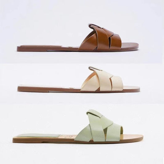 Three pairs of sandals in brown, beige, and green 