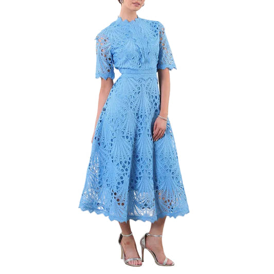 Woman wearing a rose red retro cinched A-line dress with short sleeves and fitted waist
