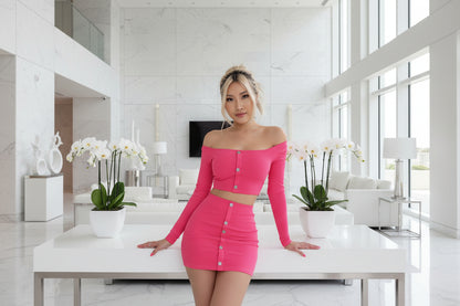 Women's knit two-piece outfit with off-shoulder design and button details

