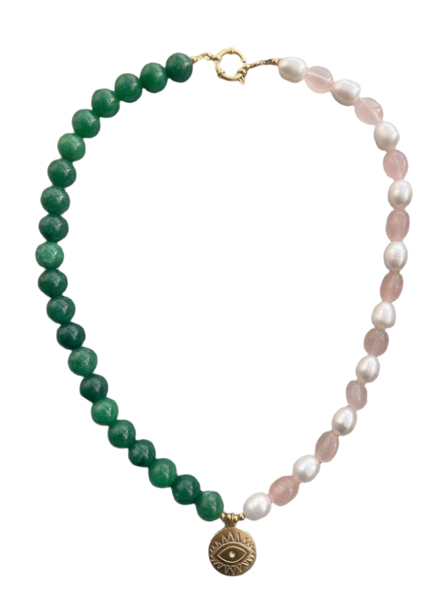 Necklace with green beads, rose quartz stones, and a gold evil eye charm 