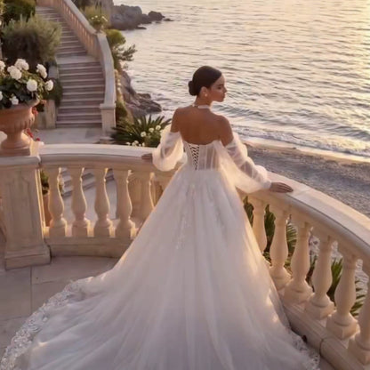 Ivory Lace Ball Gown with Sheer Bishop Sleeves