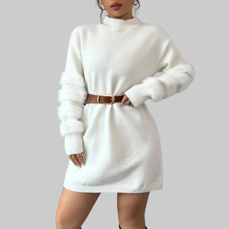 Detail shot of soft plush fabric texture on white mini dress

