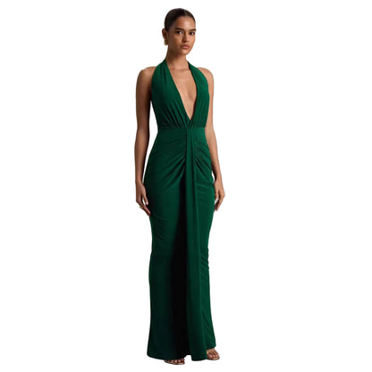 Emerald green open back halter maxi dress – back view showing open spine and halter tie at neck
