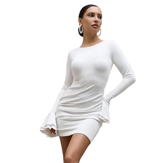 White figure-hugging dress with romantic ruffled sleeve detail

