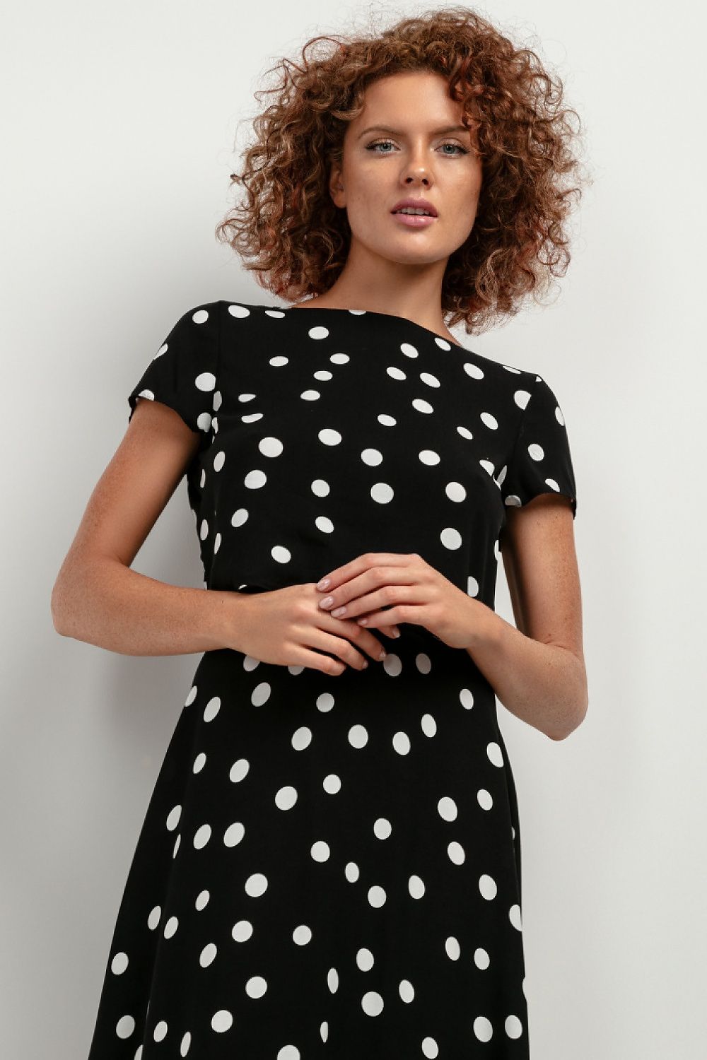 elegant  black outfit with white polka dots 