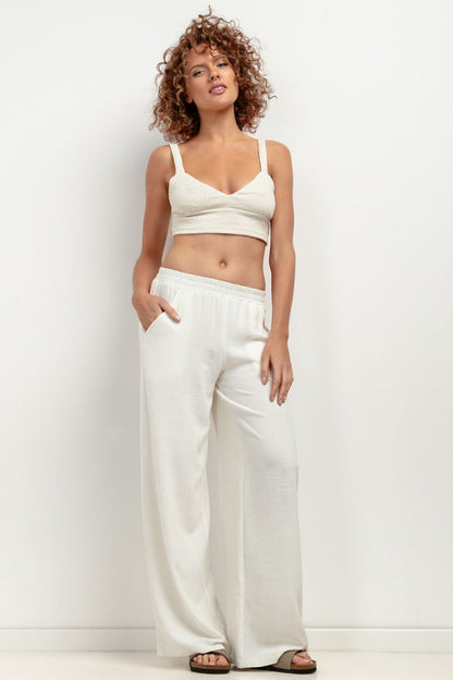 Wide-leg white linen trousers with soft European fabric