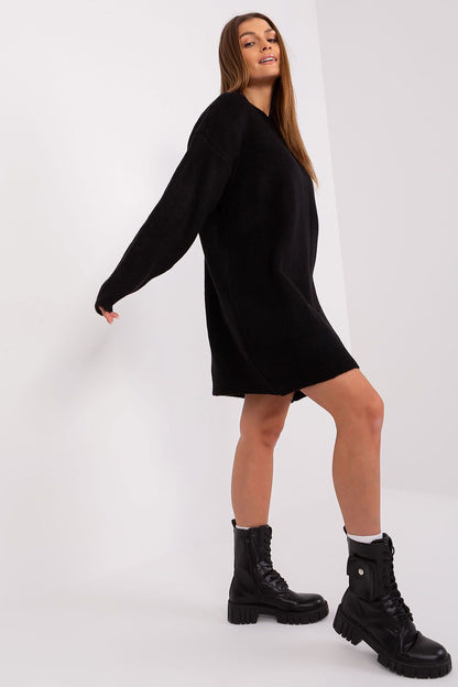 Model wearing luxury knitted Badu mini dress with round neckline