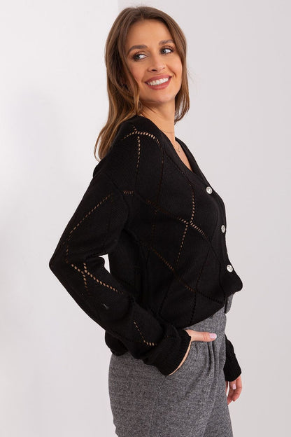  black cardigan with decorative buttons
