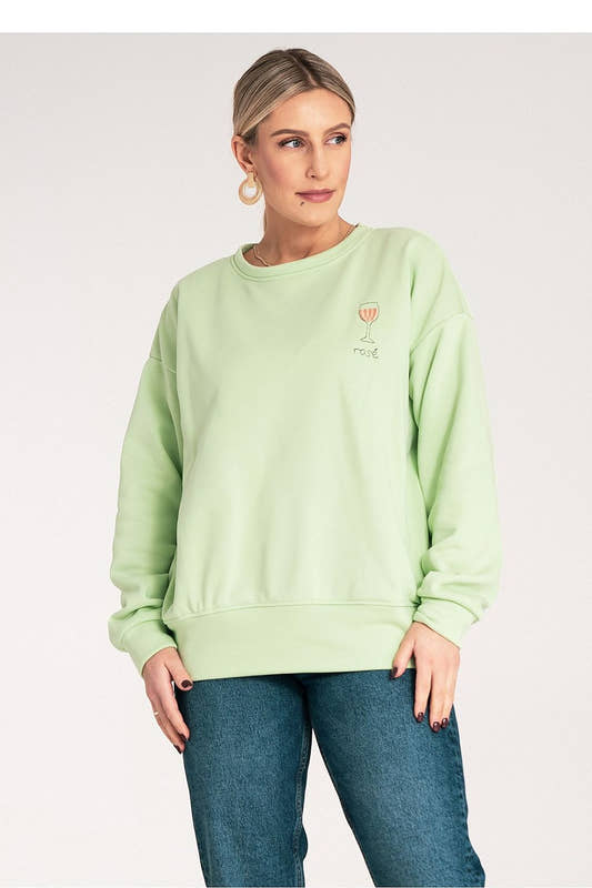 light green sweatshirt with a small graphic on a plain 