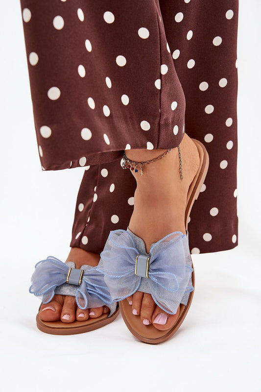 Brown sandals with blue bow details
