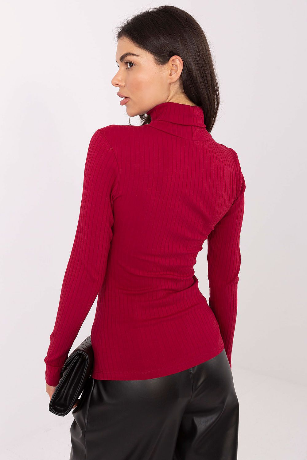 Red ribbed sweater featuring classic turtleneck collar and long sleeves

