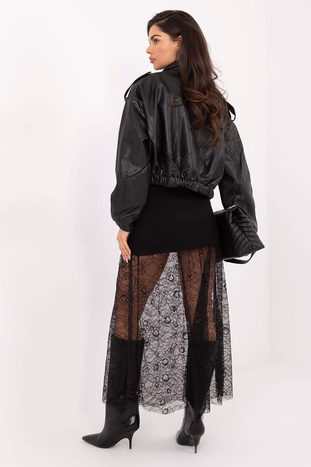 Contemporary black midi skirt with textured lace paneling and button details