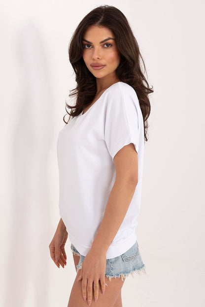 Women's white V-neck short sleeve blouse — side view flattering fit made in Europe 

