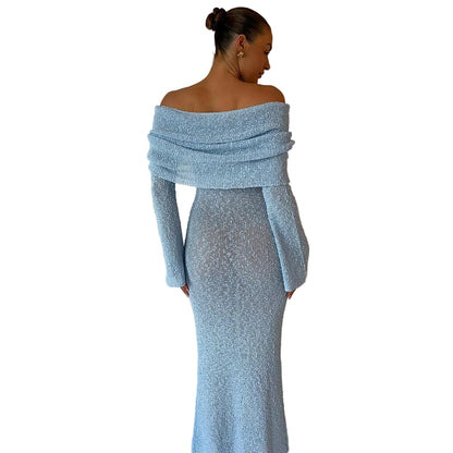 Woman wearing a light blue off-shoulder dress 