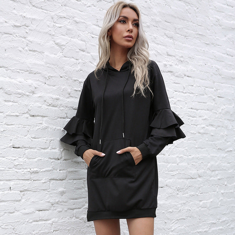 Women wearing pullover hoodie black skirt dress with feminine ruffles
