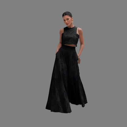 Woman in a black lace skirt outfit  for wedding celebration 