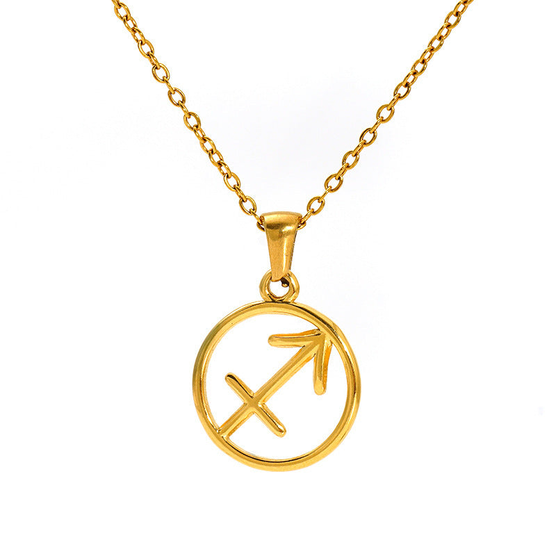 Gold necklace with a circular pendant featuring an arrow design 