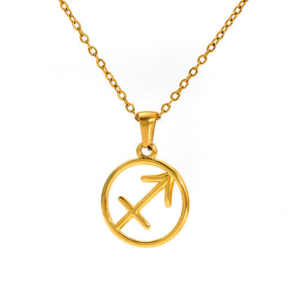 Gold necklace with a circular pendant featuring an arrow design 