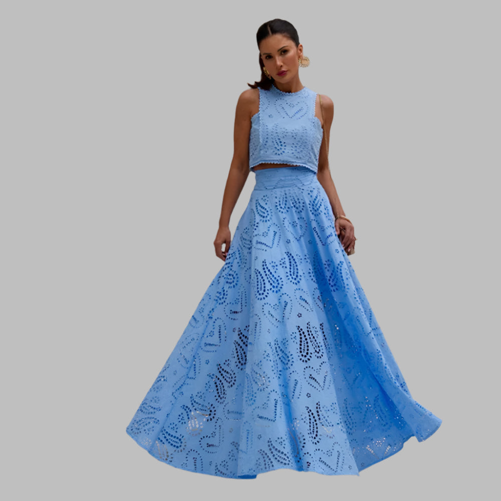 Woman wearing a blue lace skirt set 