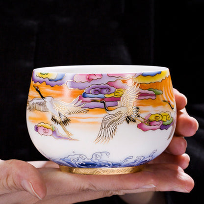 Artisan shaping an Auspicious Crane Tea Cup on pottery wheel