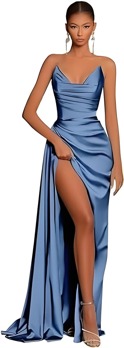Woman wearing a blue strapless gown with a high slit 