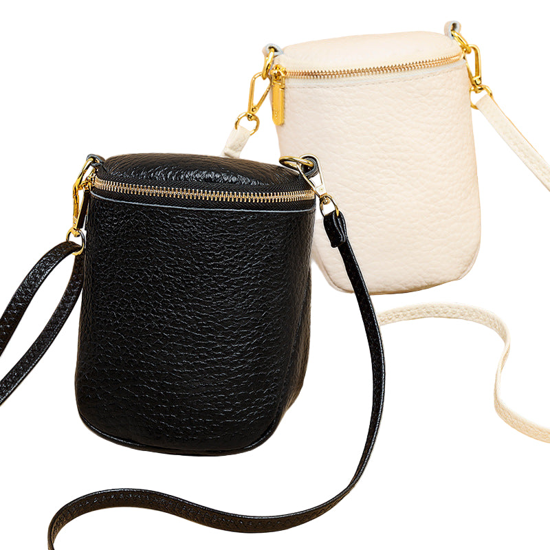 Genuine cowhide crossbody purse with gold hardware and adjustable strap

