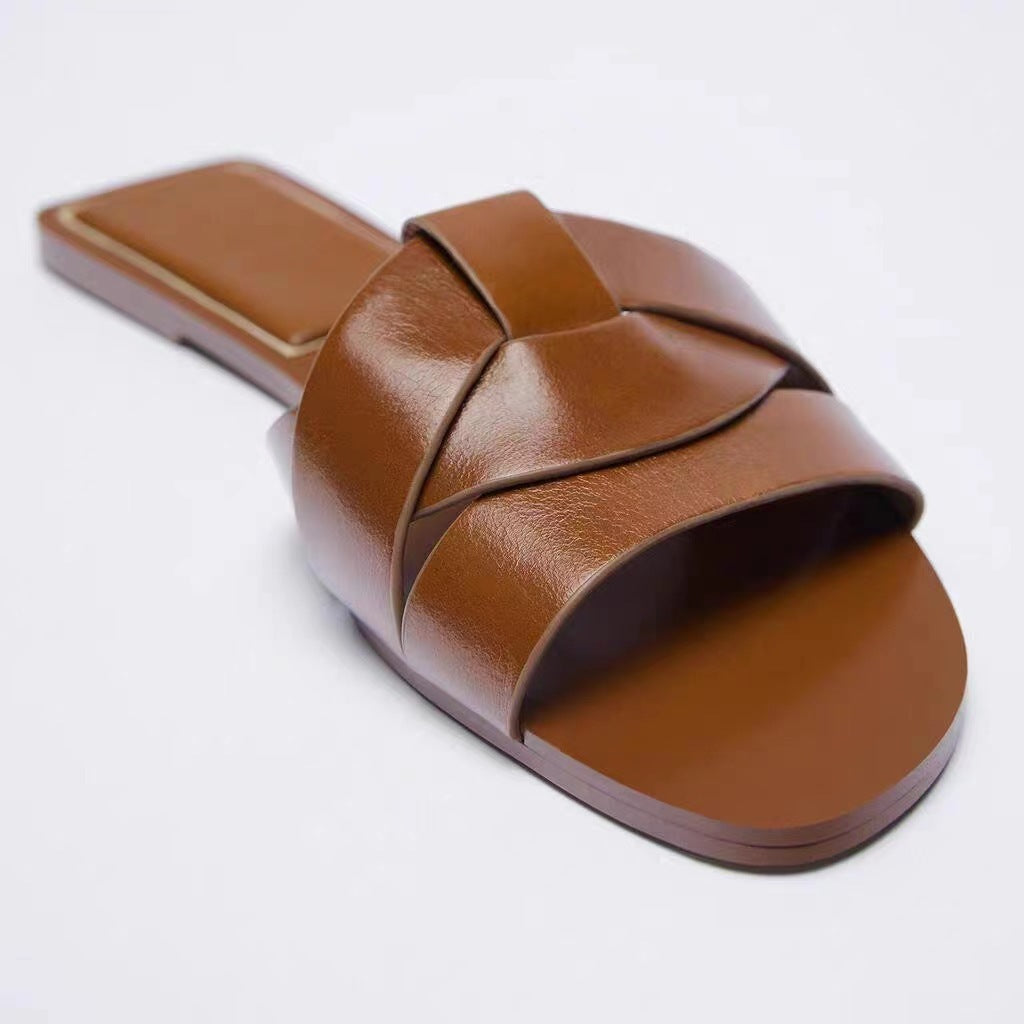 Brown leather sandal with woven design 