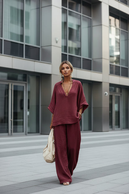 Full outfit flat lay of V-neck tee and pants two-piece set in all five colour options